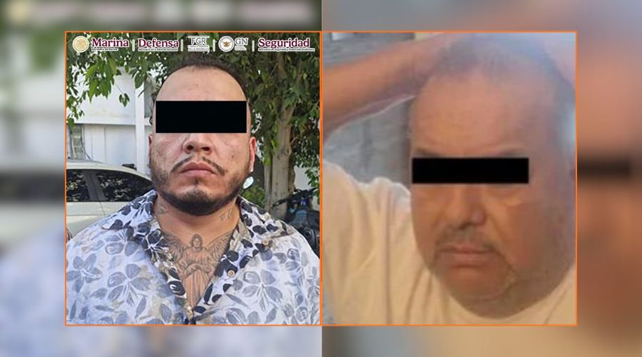 Dos personas con el rostro cubierto, detenidos