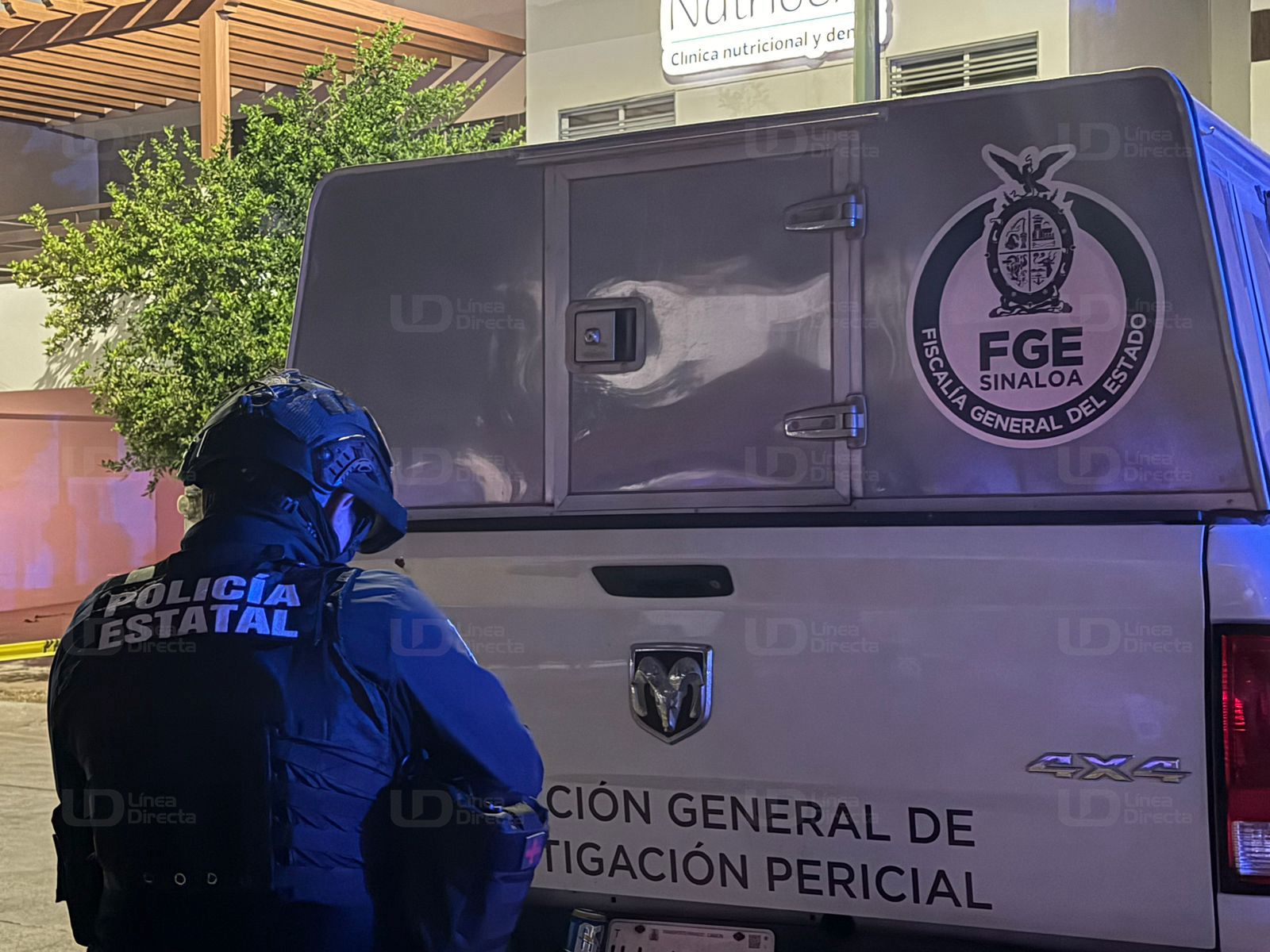 Unidad de la FGE y un elemento de la policía estatal