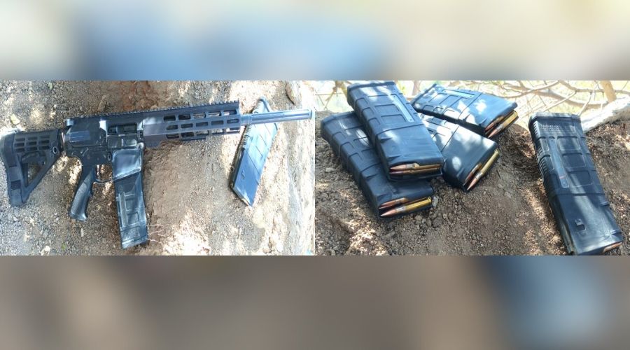 Arma de fuego y cartuchos asegurados