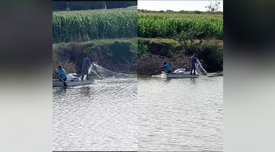 Personas en lancha en un río pescando