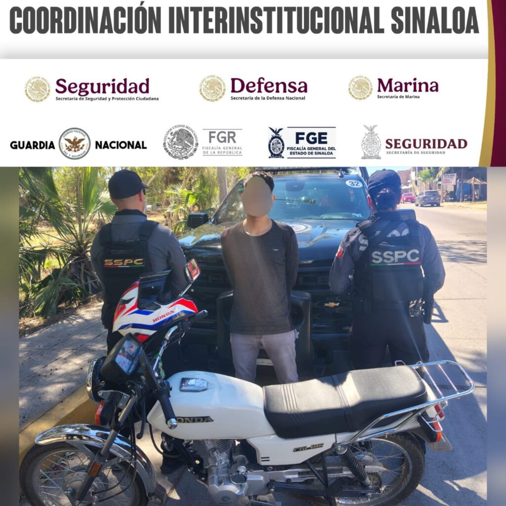 Persona detenida junto a dos elementos de seguridad 