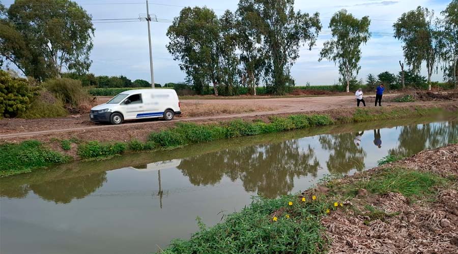 Localizan a hombre asesinado flotando en canal de riego en Culiacán
