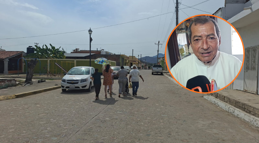En grande calles de concordia y personas transitando, en circulo párroco entrevistado por LD