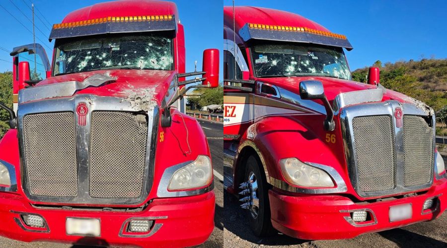 tráiler color rojo con impactos de bala