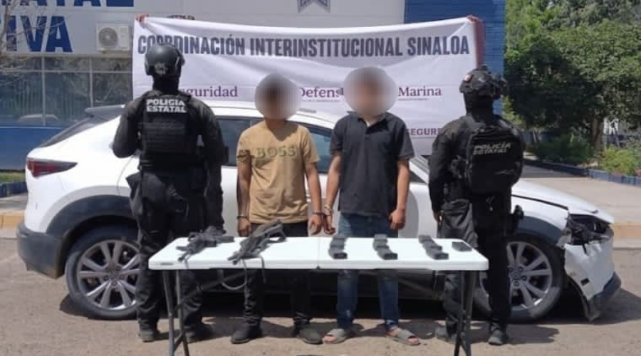 Policía detiene a dos hombres