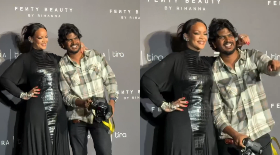 Rihanna junto con un fotógrafo en un evento en India.
