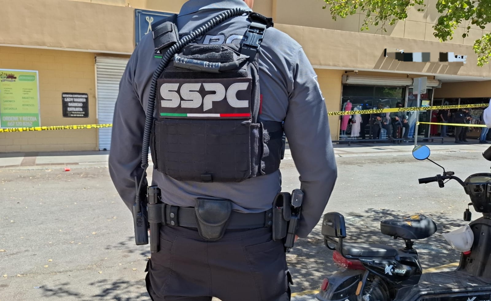Personal de la SSPC frente a una zona acordonada