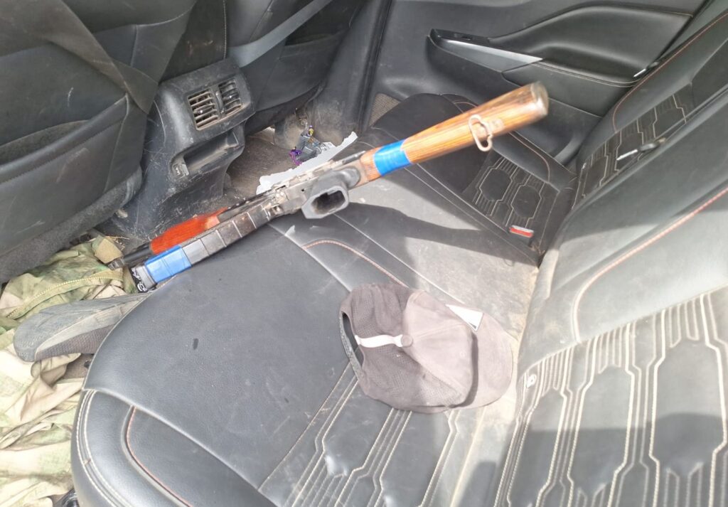 Arma dentro de la camioneta