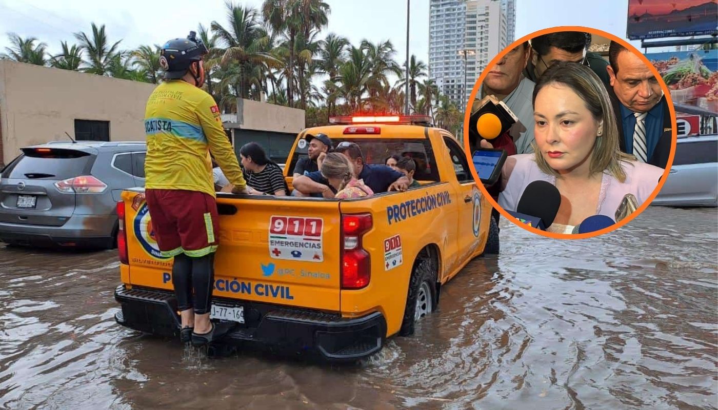 Unidad de PC y elementos arriba de ella con personas rescatadas transitando por una calle inundada tras lluvia