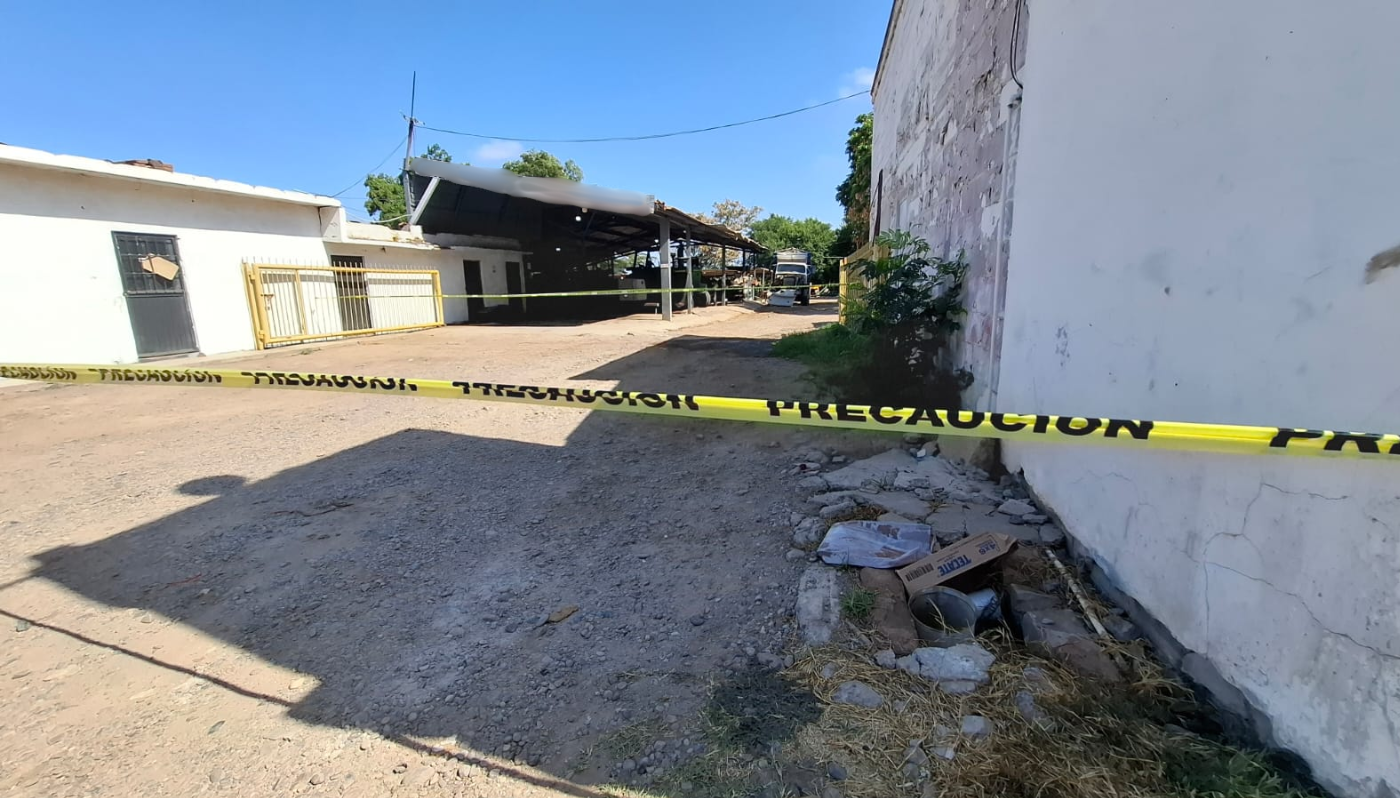 Taller delimitado por una cinta policial
