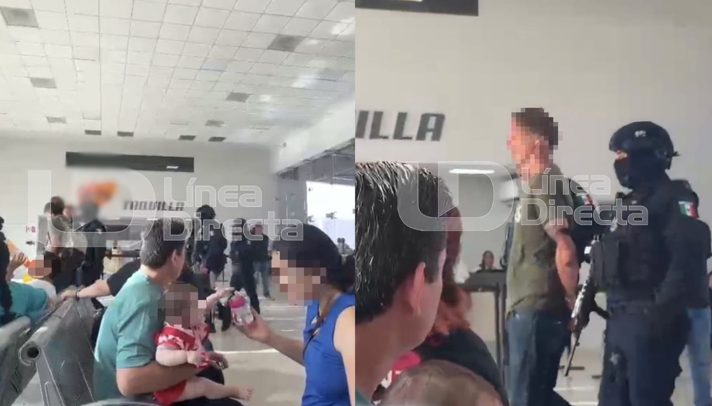 Elementos de seguridad con una persona con esposas en sus manos