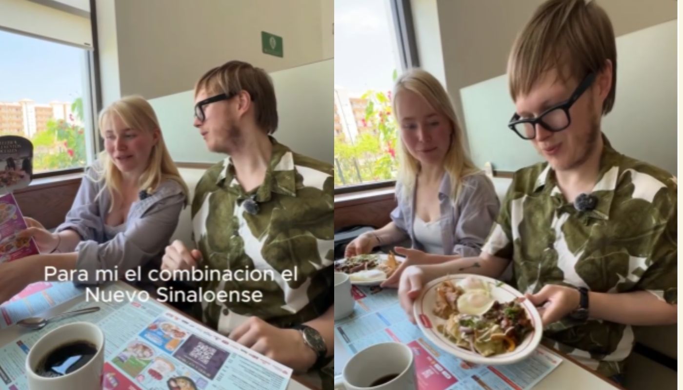 Dos personas con platillos de un restaurante