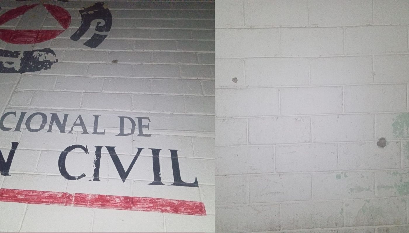 barda de un edificio con impactos de bala